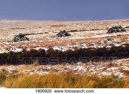 Traditional turf cutting, Ireland View Large Photo Image Stock Photograph - Traditional turf cutting, Ireland. Fotosearch