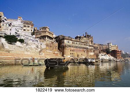 Stock Photo - Waterfront property on the Ganges river, Varanasi, India. Fotosearch