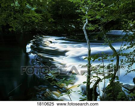 Stock Photography - Weir on the Crana River, Buncrana, County Donegal, Republic Of Ireland. Fotosearch