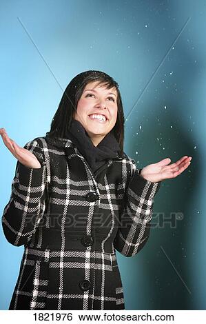 Woman watching snowflakes View Large Photo Image Stock Photograph - Woman watching snowflakes. Fotosearch