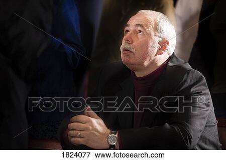 A man praying View Large Photo Image Stock Photo - A man praying. Fotosearch