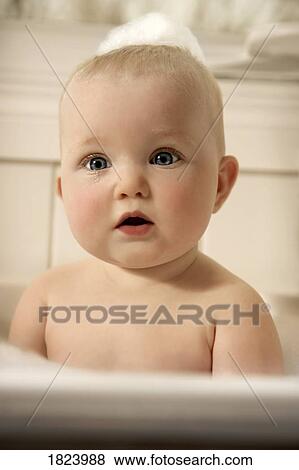 Stock Photo - Baby in the bath . Fotosearch