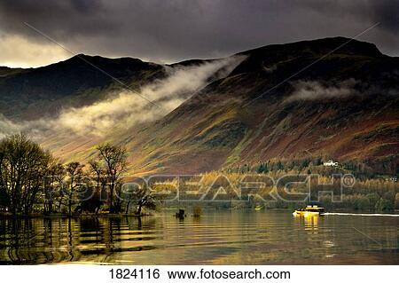 Stock Photograph - Boat on Lake Derwent, Cumbria, England. Fotosearch