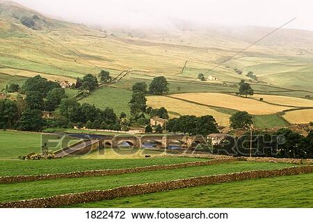 Bridge and fields, Burnsall, Yorkshire Dales National Park, England View Large Photo Image Stock Image - Bridge and fields, Burnsall, Yorkshire Dales National Park, England. Fotosearch