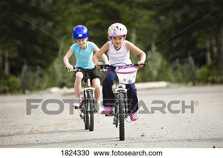 Children riding bicycles View Large Photo Image Stock Image - Children riding bicycles . Fotosearch