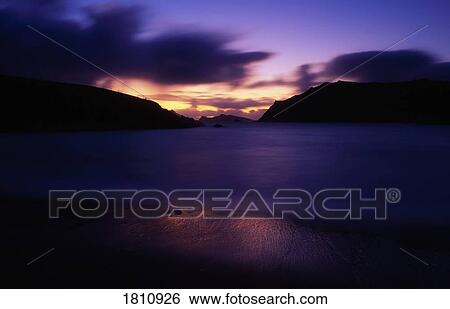 Clogher Beach at sunset, Dingle Peninsula, Co Kerry, Ireland View Large Photo Image Stock Photograph - Clogher Beach at sunset, Dingle Peninsula, Co Kerry, Ireland. Fotosearch