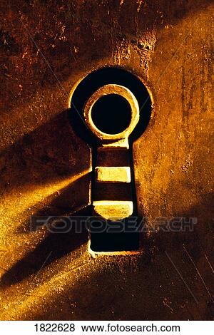 Close-up of skeleton key through keyhole View Large Photo Image Stock Photo - Close-up of skeleton key through keyhole. Fotosearch