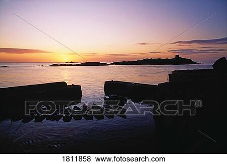 Co Dublin, Colimore Harbour and Dalkey Island in the distance, Ireland View Large Photo Image Stock Photo - Co Dublin, Colimore Harbour and Dalkey Island in the distance, Ireland. Fotosearch