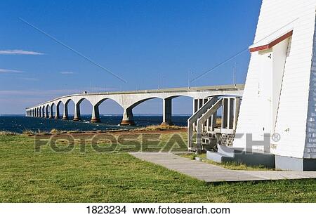 Picture - Confederation Bridge and Amherst Point Lighthouse, Prince Edward Island, Canada. Fotosearch