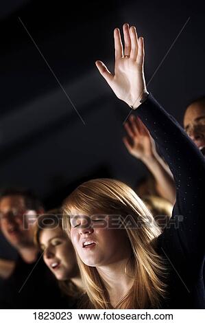 Stock Image - Corporate worship. Fotosearch