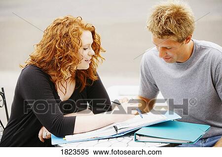 Stock Photography - Couple studying together. Fotosearch