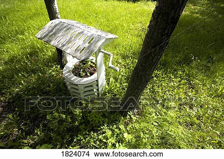Decorative well View Large Photo Image Picture - Decorative well. Fotosearch