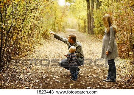 Stock Image - Family out for a walk. Fotosearch
