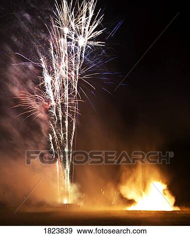Fireworks next to a bonfire View Large Photo Image Stock Photo - Fireworks next to a bonfire. Fotosearch