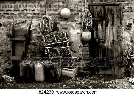 Stock Image - Fishing hut and supplies. Fotosearch