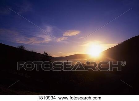 Glendalough at sunrise, Co Wicklow, Ireland View Large Photo Image Picture - Glendalough at sunrise, Co Wicklow, Ireland. Fotosearch