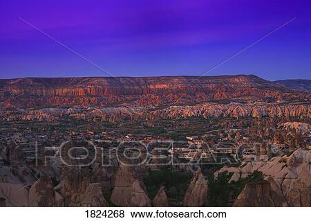 Stock Photo - Goreme valley at dusk, Cappadocia, Anatolia, Turkey . Fotosearch