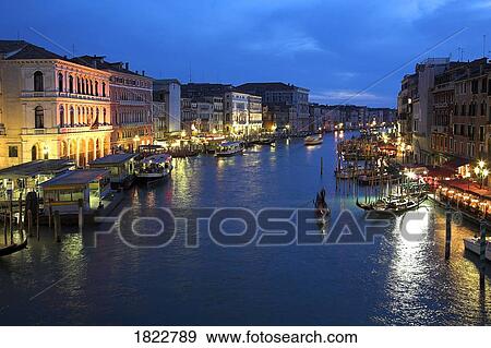 Stock Photo - Grand Canal at night from the Rialto Bridge . Fotosearch
