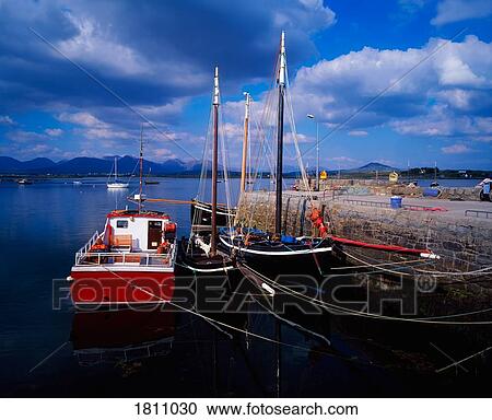 Hookers in Roundstone Harbour, Connemara, Co Galway, Ireland View Large Photo Image Stock Image - Hookers in Roundstone Harbour, Connemara, Co Galway, Ireland. Fotosearch