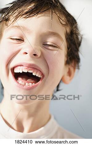 Stock Image - Laughing boy. Fotosearch