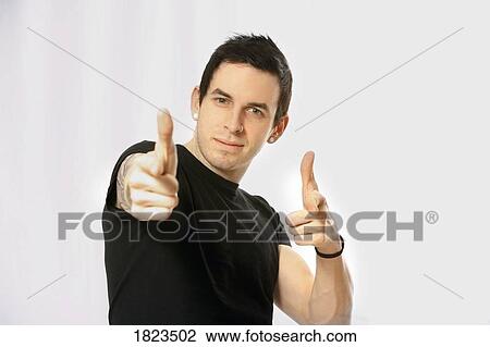 Stock Image - Man pointing ahead. Fotosearch