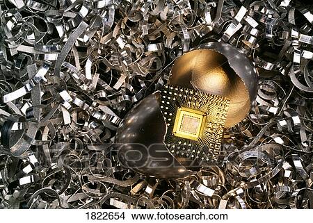 Nest with a broken silver egg containing a micro chip View Large Photo Image Picture - Nest with a broken silver egg containing a micro chip. Fotosearch