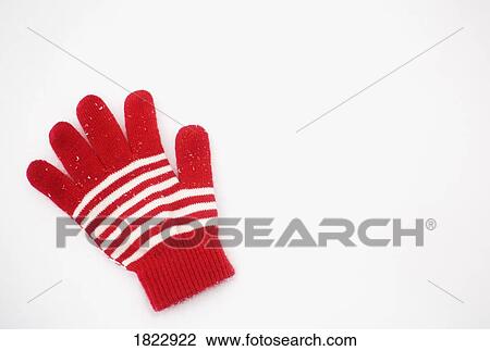 One red and white glove laying in the snow View Large Photo Image Stock Image - One red and white glove laying in the snow. Fotosearch