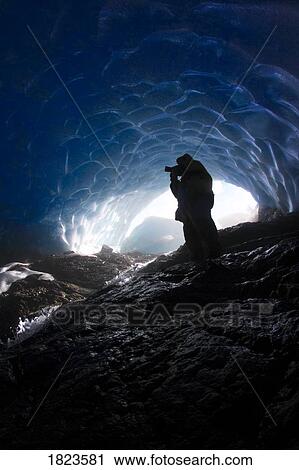 Person in an ice cave View Large Photo Image Stock Image - Person in an ice cave. Fotosearch