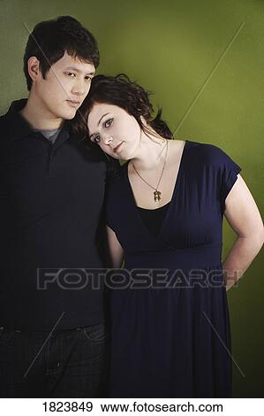 Stock Photo - Portrait of a young couple. Fotosearch