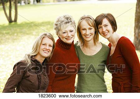 Stock Image - Portrait of women together. Fotosearch