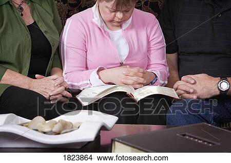 Praying together View Large Photo Image Picture - Praying together. Fotosearch