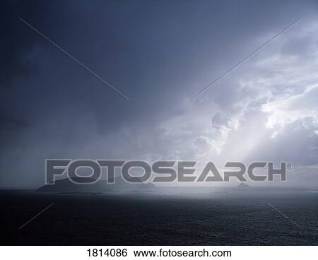 Rainclouds over Blasket Islands, Co Kerry, Ireland View Large Photo Image Stock Photograph - Rainclouds over Blasket Islands, Co Kerry, Ireland. Fotosearch