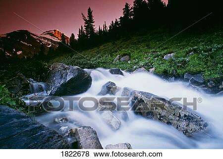 Stock Photo - Small Stream, Skoki Valley, Banff National Park, Alberta, Canada. Fotosearch