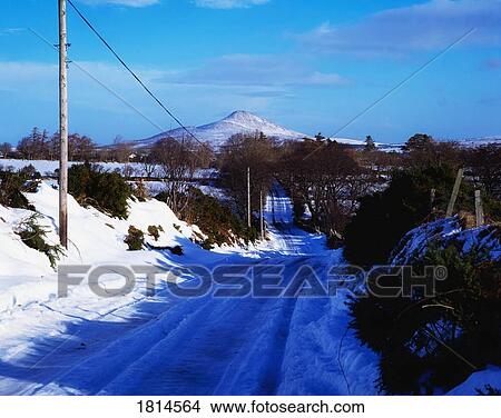 Snowy road near Sugarloaf Mountain, Co Wicklow, Ireland View Large Photo Image Picture - Snowy road near Sugarloaf Mountain, Co Wicklow, Ireland. Fotosearch