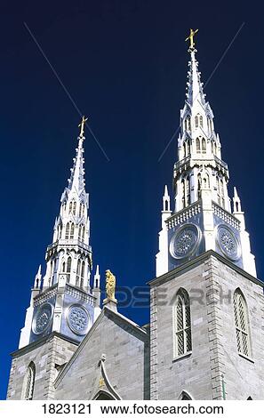 Stock Image - Spires of Notre Dame Cathedral Basilica of Ottawa, Ontario. Fotosearch