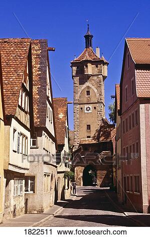 Stock Image - Street in the historic walled town of Rothenburg ob der Tauber, Germany. Fotosearch