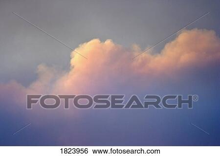 Stock Photograph - Sunlit clouds. Fotosearch