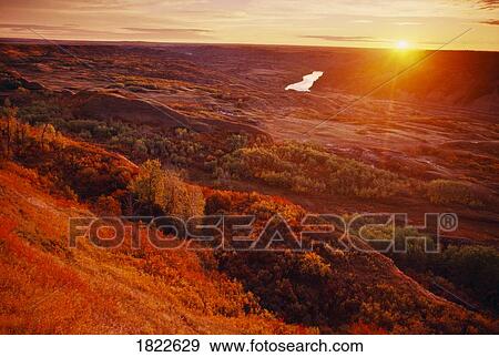 Sunrise over Dry Island Buffalo Jump Provincial Park in Fall, Alberta, Canada View Large Photo Image Stock Photo - Sunrise over Dry Island Buffalo Jump Provincial Park in Fall, Alberta, Canada. Fotosearch
