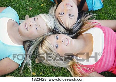 Stock Photo - Three teenagers. Fotosearch