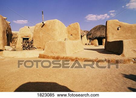 Traditional mud houses near Jaisalmer, India View Large Photo Image Stock Photography - Traditional mud houses near Jaisalmer, India. Fotosearch