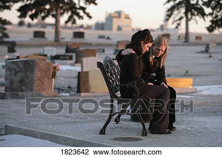 Two women praying together View Large Photo Image Stock Image - Two women praying together . Fotosearch