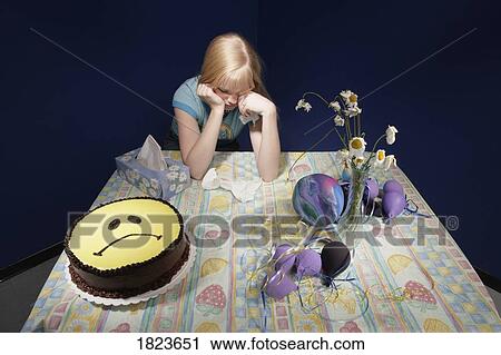 Upset girl surrounded by party supplies View Large Photo Image Stock Image - Upset girl surrounded by party supplies. Fotosearch