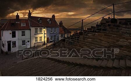 Stock Photograph - Village at night, Whitby, Yorkshire, England. Fotosearch