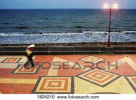 Walking on the promenade View Large Photo Image Stock Image - Walking on the promenade. Fotosearch