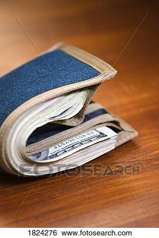 Wallet full of money View Large Photo Image Stock Photograph - Wallet full of money . Fotosearch