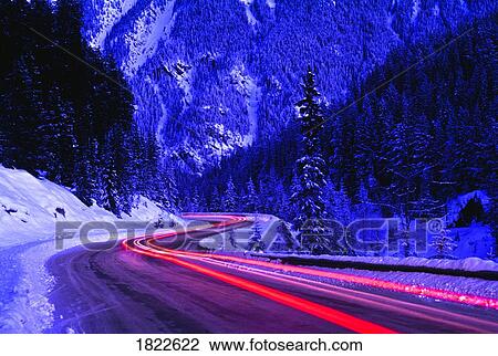 Winding road through the mountains, Banff National Park, Alberta, Canada View Large Photo Image Stock Image - Winding road through the mountains, Banff National Park, Alberta, Canada. Fotosearch