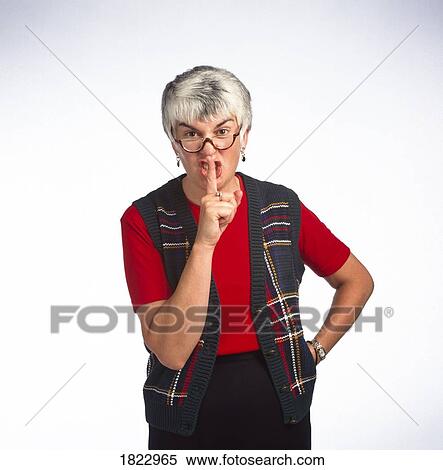Stock Photography - Woman saying quiet. Fotosearch