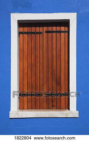 Picture - Wooden shuttered window, Burano, Italy . Fotosearch