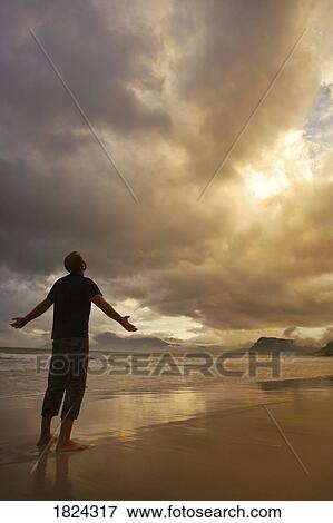 Stock Photo - Worship on a beach. Fotosearch