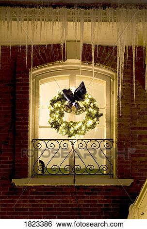 Wreath in a window View Large Photo Image Stock Photograph - Wreath in a window. Fotosearch
